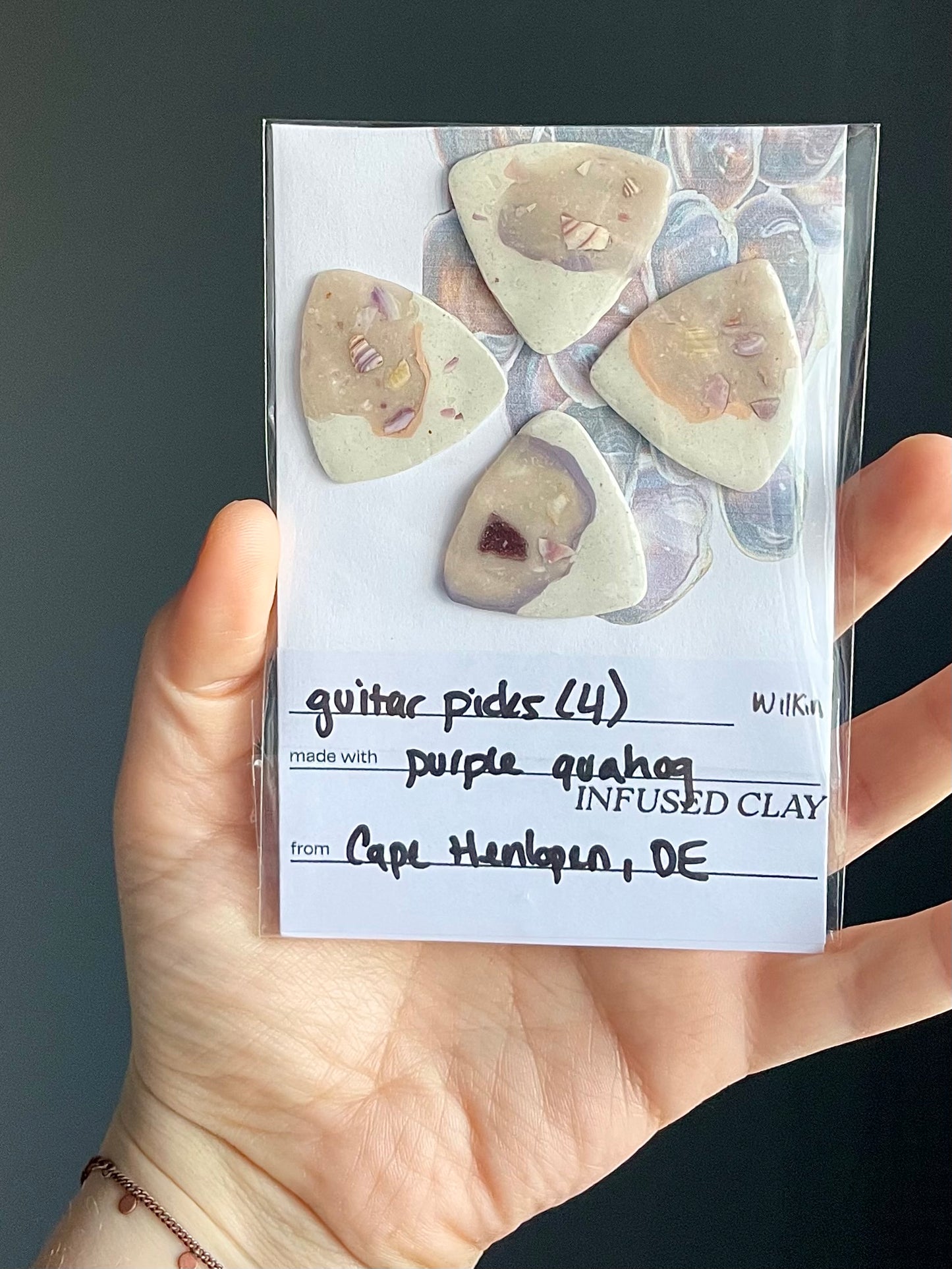 guitar picks (4) made of purple quahog clay