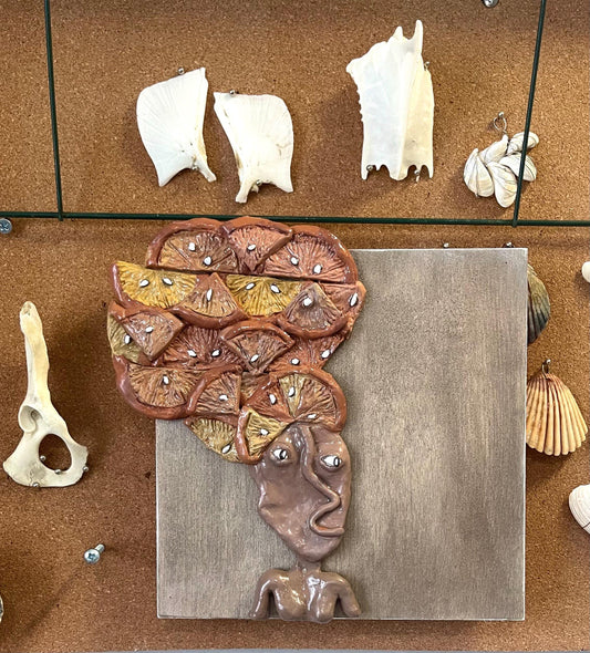 Citronella - lemon lady wall portrait relief sculpture