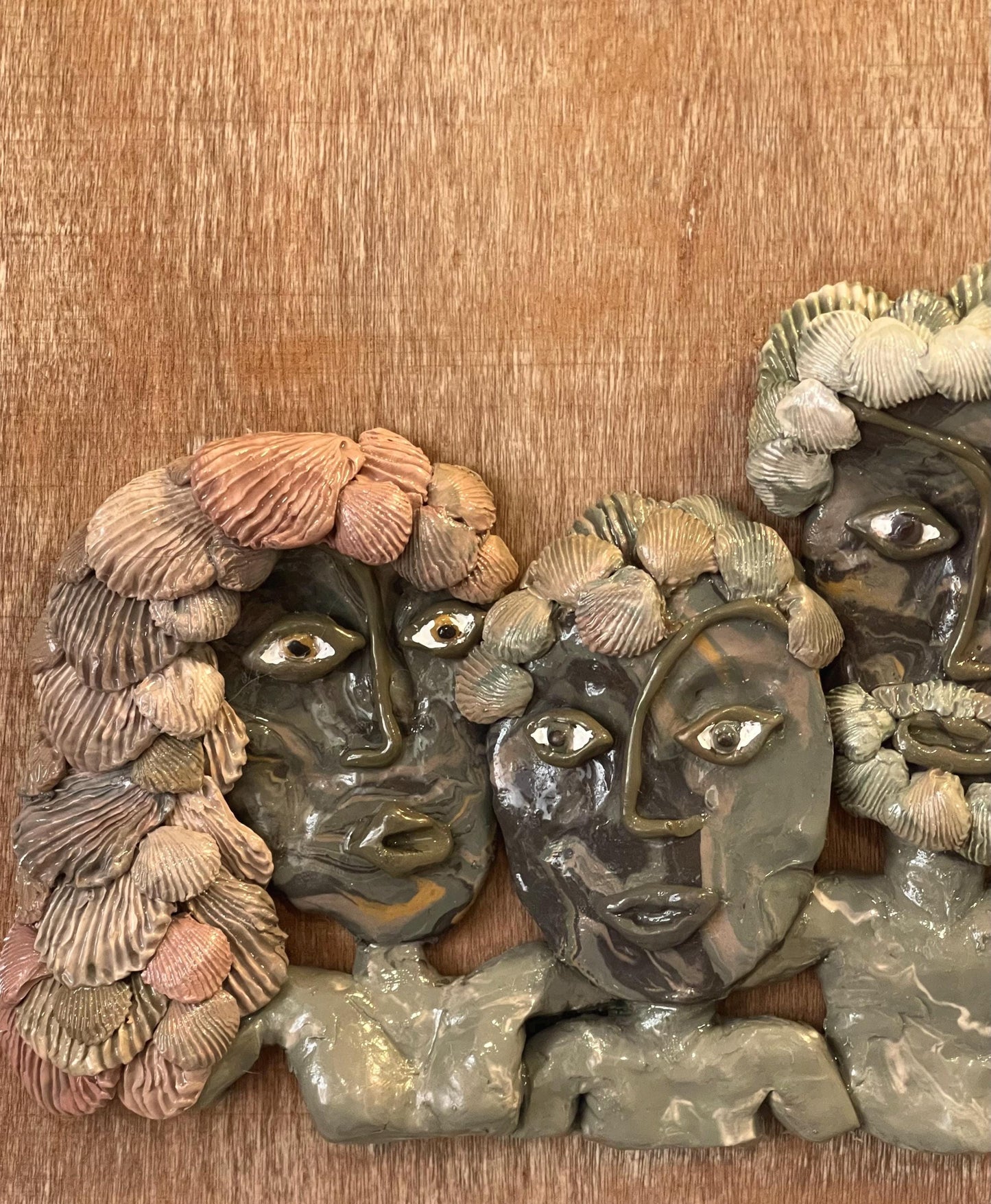 Meet the Clams - family of 3 portrait, wall relief sculpture, mom dad and child family