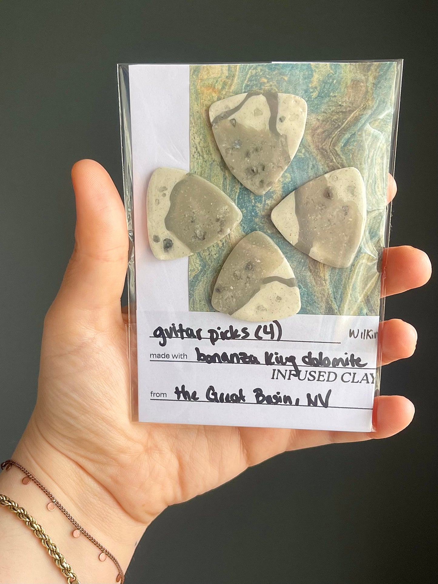 guitar picks (4) made of bonanza king dolomite clay