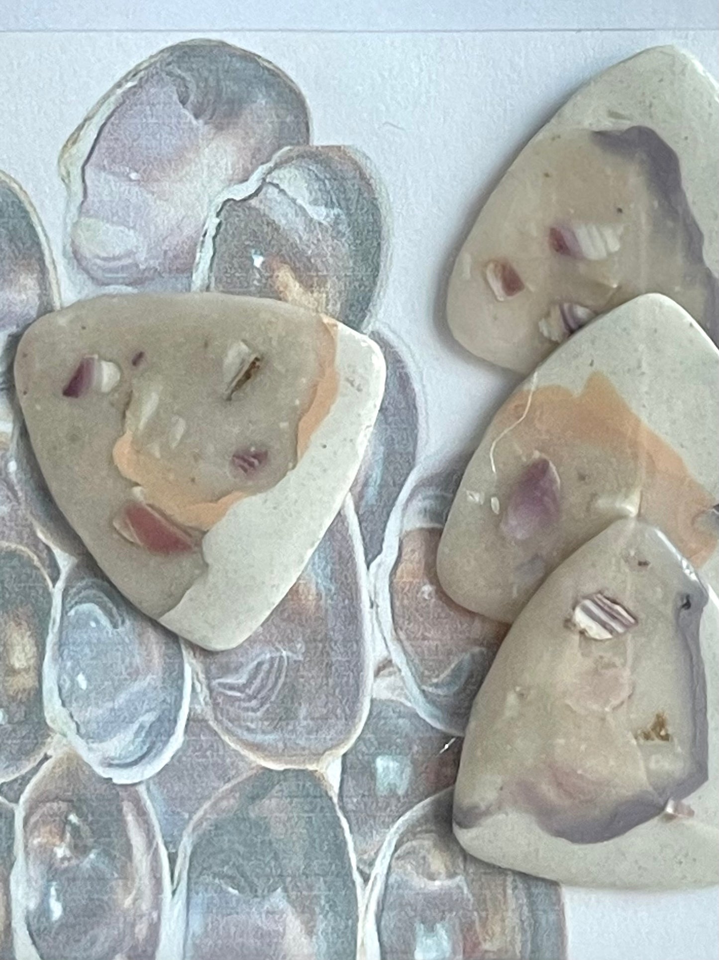 guitar picks (4) made of purple quahog clay