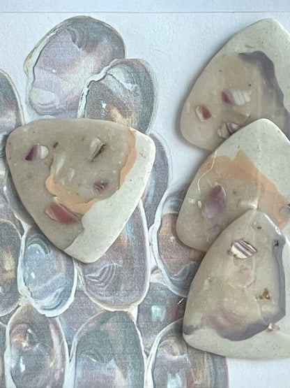 guitar picks (4) made of purple quahog clay