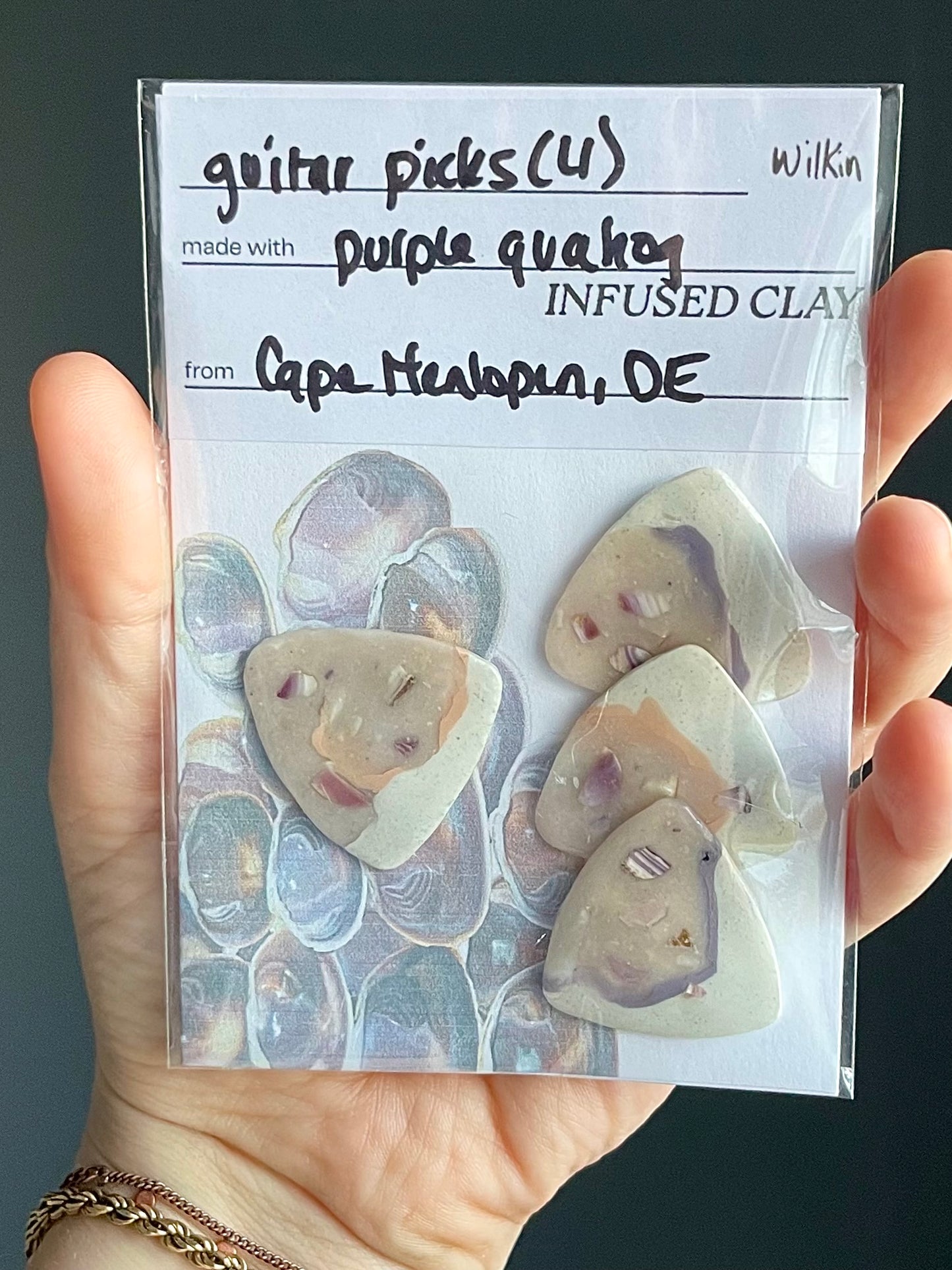 guitar picks (4) made of purple quahog clay