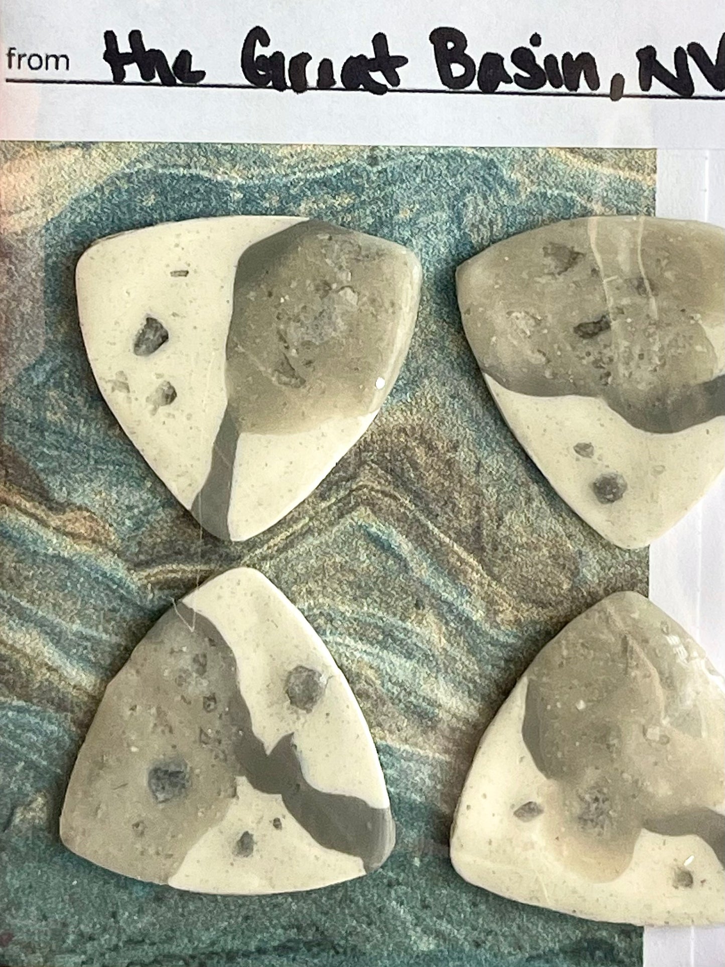 guitar picks (4) made of bonanza king dolomite clay
