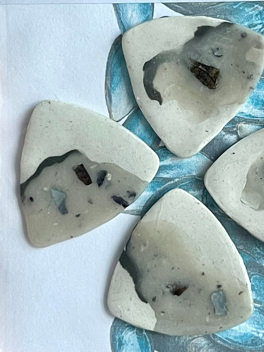 guitar picks (4) made of blue mussel clay
